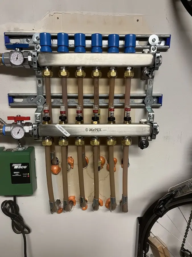 Plumber performing Gas Leak Detection at a residential property in North Kingstown